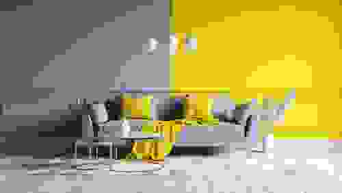 pareti gialle e grigie in soggiorno