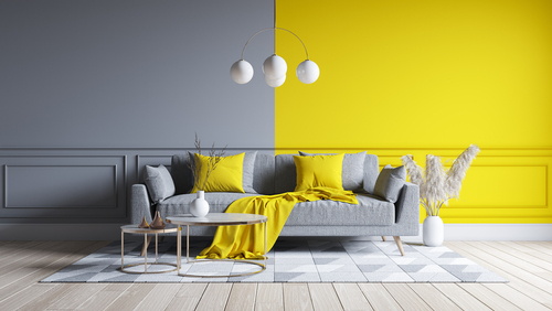 pareti gialle e grigie in soggiorno